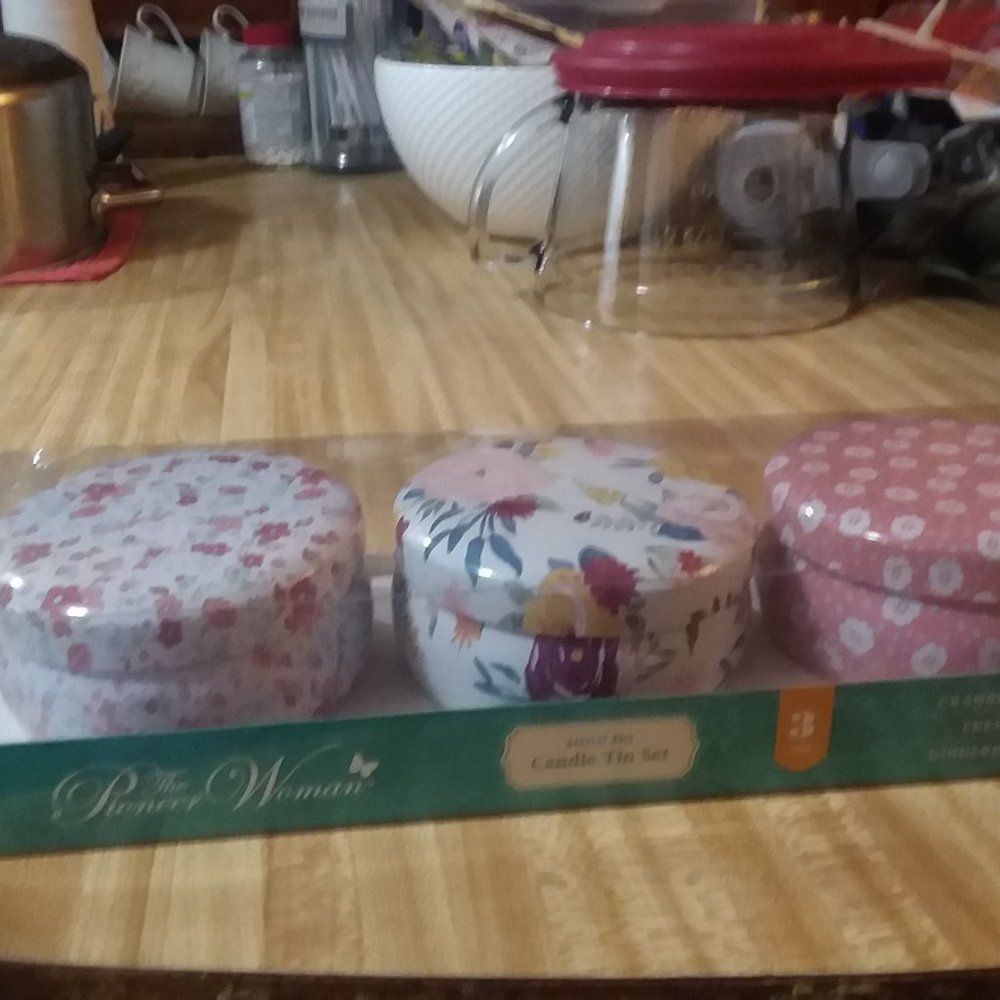 Candles in tins